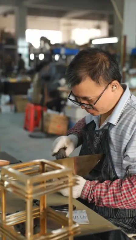 Assembling custom brass sconce frame