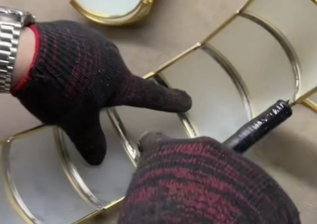 Close-up of seamless hand-soldered brass lantern joint