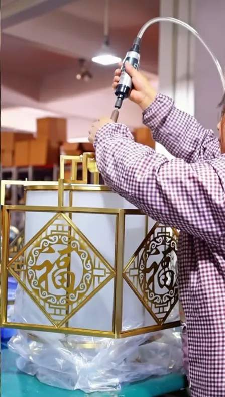 Fitting glass panels into brass lantern frame
